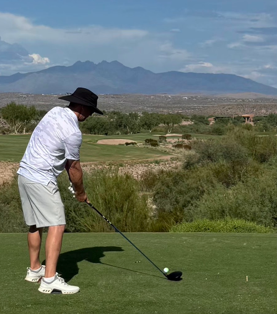 Young golfer on a West Texas golf course